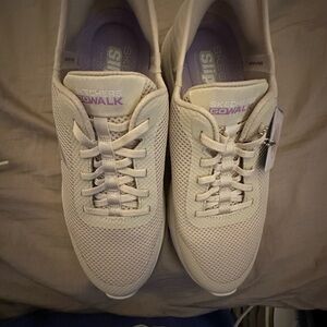 Skechers breathable cream mesh sneakers with lavender logo
